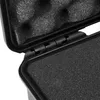 Close-up view of the hinge and foam interior of an open black hard case. Produktbild-Vorschau