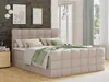 A bedroom scene with a beige boxspring bed as the main focus. Produktbild-Vorschau