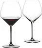 Two wine glasses on a white background. One glass contains red wine. Podgląd zdjęcia produktu