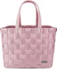 A pink woven shopping basket with pink handles against a white background.