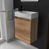 A bathroom vanity with a sink and faucet, with towels hanging on a rack. Produktbild-Vorschau