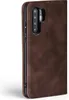 A close-up side view of a brown leather flip phone case for a Huawei P30. Produktbild-Vorschau