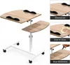 A collage of images showcasing a mobile laptop table with different features. Produktbild-Vorschau
