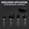 A collection of interchangeable plug adapters for worldwide application, shown with a power adapter in the background. Produktbild-Vorschau