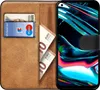 A book-style phone case with a smartphone inside, showing cards and banknotes in the wallet section. Produktbild-Vorschau