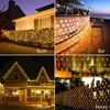 Collage of four images showing solar LED net lights used in different outdoor settings: on bushes, around a bar, on a house, and on a fence. Náhled obrázku produktu