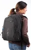 A woman wearing a backpack. Náhľad obrázku produktu