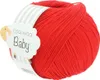 A ball of red yarn with a product label attached. Produktbild-Vorschau