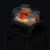 A cutaway view of an electric grill showing its internal heating and air circulation system. Voir les images du produit