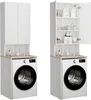 Two identical white washing machine cabinets with wooden countertops are shown side-by-side against a white background. The cabinet on the right has its door open, revealing shelves stocked with various toiletries and cleaning supplies. Anteprima dell’immagine prodotto
