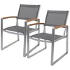 Two outdoor chairs with metal frames and gray mesh seats and backs, and wooden armrests, are shown against a white background. Produktbild-Vorschau