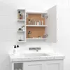 A white bathroom cabinet with its door open, displaying various cosmetic products on shelves. Voir les images du produit