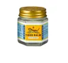 A hexagonal glass jar of Tiger Balm White ointment with a gold lid, set against a white background. Náhled obrázku produktu