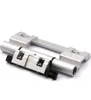A silver-colored metal hardware component, likely a roller clamp band, is presented against a white background. Produktbild-Vorschau