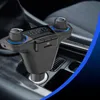 A car's center console with a Bluetooth FM transmitter plugged into the cigarette lighter socket. Anteprima dell’immagine prodotto