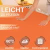 A person's hands are shown on an orange fabric, likely a bedsheet, with marketing text and icons indicating product features. Produktbild-Vorschau