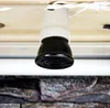 A close-up view of a black ceramic heat emitter bulb socket attached to a wooden surface. Podgląd zdjęcia produktu