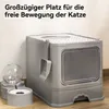 A gray cat litter box with a scoop attached, and a gray water dispenser with a clear spherical reservoir, are placed on a wooden floor against a white wall. Produktbild-Vorschau