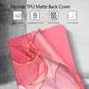 A close-up of a pink marble-patterned tablet case, with a section peeled back to show the flexible TPU material. Produktbild-Vorschau