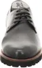 A close-up, front-facing view of a black lace-up shoe. Anteprima dell’immagine prodotto
