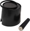 A black cylindrical object with a rubber band around the top, and a black cylindrical handle with indentations and a metal end are placed next to each other on a white background. Produktbild-Vorschau