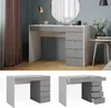 A vanity table with drawers and a mirror in a room with curtains and a side table. Anteprima dell’immagine prodotto