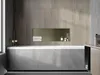 A modern bathroom with a bathtub and a built-in shelf. Voir les images du produit