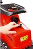 A hand is shown operating a switch on a red garden shredder. Anteprima dell’immagine prodotto