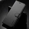 A black leather flip phone case is shown on a dark, reflective surface. Produktbild-Vorschau
