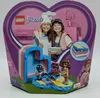 The image shows the packaging of a LEGO Friends Olivia's Summer Heart Box set, featuring illustrations of children and the toy itself. Anteprima dell’immagine prodotto