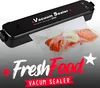 A vacuum sealer is sealing a piece of salmon in a plastic bag. Produktbild-Vorschau