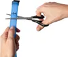 Hands are shown cutting a blue tube with scissors. Anteprima dell’immagine prodotto
