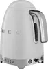 A white SMEG kettle with silver accents, shown from a side angle. Voir les images du produit