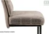 Close-up side view of a chair cushion showing internal springs. Voir les images du produit