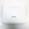 A white Zyxel router is shown from the front on a white background. Podgląd zdjęcia produktu