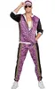 A man wearing a tracksuit costume. Produktbild-Vorschau