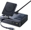 A black multi-functional charging station with a wireless charging pad and multiple ports. Anteprima dell’immagine prodotto