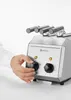 A person's hand is adjusting the dial on a HENDI toaster. Anteprima dell’immagine prodotto