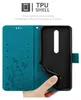 A hand is holding open a teal phone case, revealing the black TPU shell inside. Text overlays describe the product's features. Náhled obrázku produktu