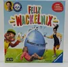The image shows the front of a board game box with cartoon characters and text. Produktbild-Vorschau