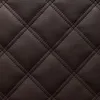 A close-up, textured view of dark brown quilted leather. Náhled obrázku produktu