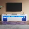 A white TV stand with blue LED lighting is shown in a living room setting with a TV mounted above it. Podgląd zdjęcia produktu