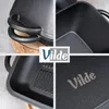 A collage of four close-up images of a black cast iron pot with handles and a textured interior, along with the brand logo. Produktbild-Vorschau
