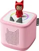 A pink Toniebox starter set with a red character figure on top. Produktbild-Vorschau