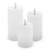 Three white LED candles of varying heights are arranged in a group on a white background. Voir les images du produit