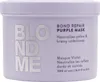 A close-up shot of a purple hair mask jar with silver lettering. Podgląd zdjęcia produktu