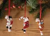 Christmas ornaments hanging from a tree branch. Podgląd zdjęcia produktu
