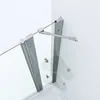 A close-up view of a shower enclosure corner, showing the glass panels and metal framing. Produktbild-Vorschau