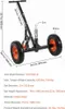 A black trailer mover with orange wheels, shown with dimensions and specifications overlaid. Produktbild-Vorschau