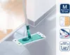 A mop is being used to clean a floor, transitioning from a wooden floor to a tiled floor. Produktbild-Vorschau